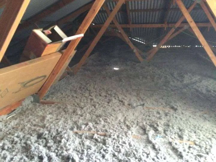 Seamless grey cellulose carpet laid flush across ceiling joists, alternate angle, Comfort Zone install