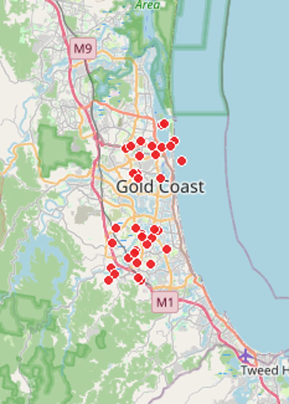 Map of the Gold Coast dotted with red pins marking homes Comfort Zone Insulation has helped — from Ormeau and Coomera down through Helensvale, Nerang, Robina and Burleigh to Currumbin and Coolangatta, and up into the Mudgeeraba–Tamborine hinterland