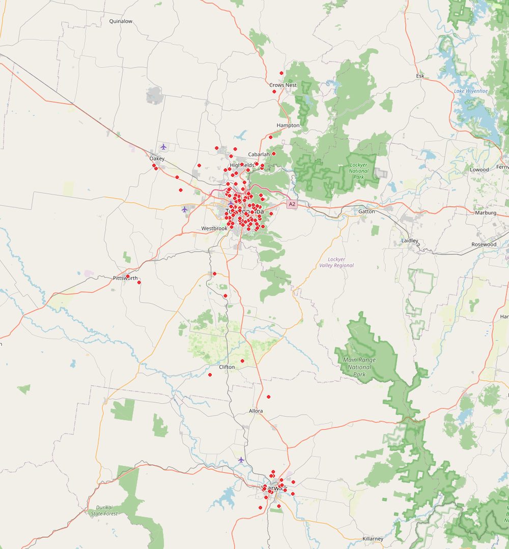 Map of the Toowoomba, Darling Downs and Granite Belt region dotted with red pins marking homes Comfort Zone Insulation has helped — clustered around Toowoomba and Highfields, out to Oakey, Pittsworth, Crows Nest, Clifton, Allora and Warwick