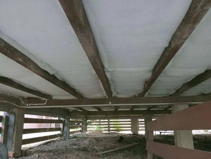 White polyester underfloor batts that push into place and self-support under a raised timber floor